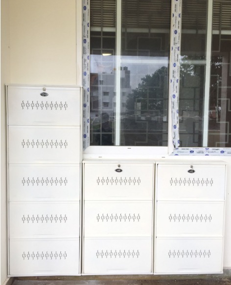 white color metal shoe racks